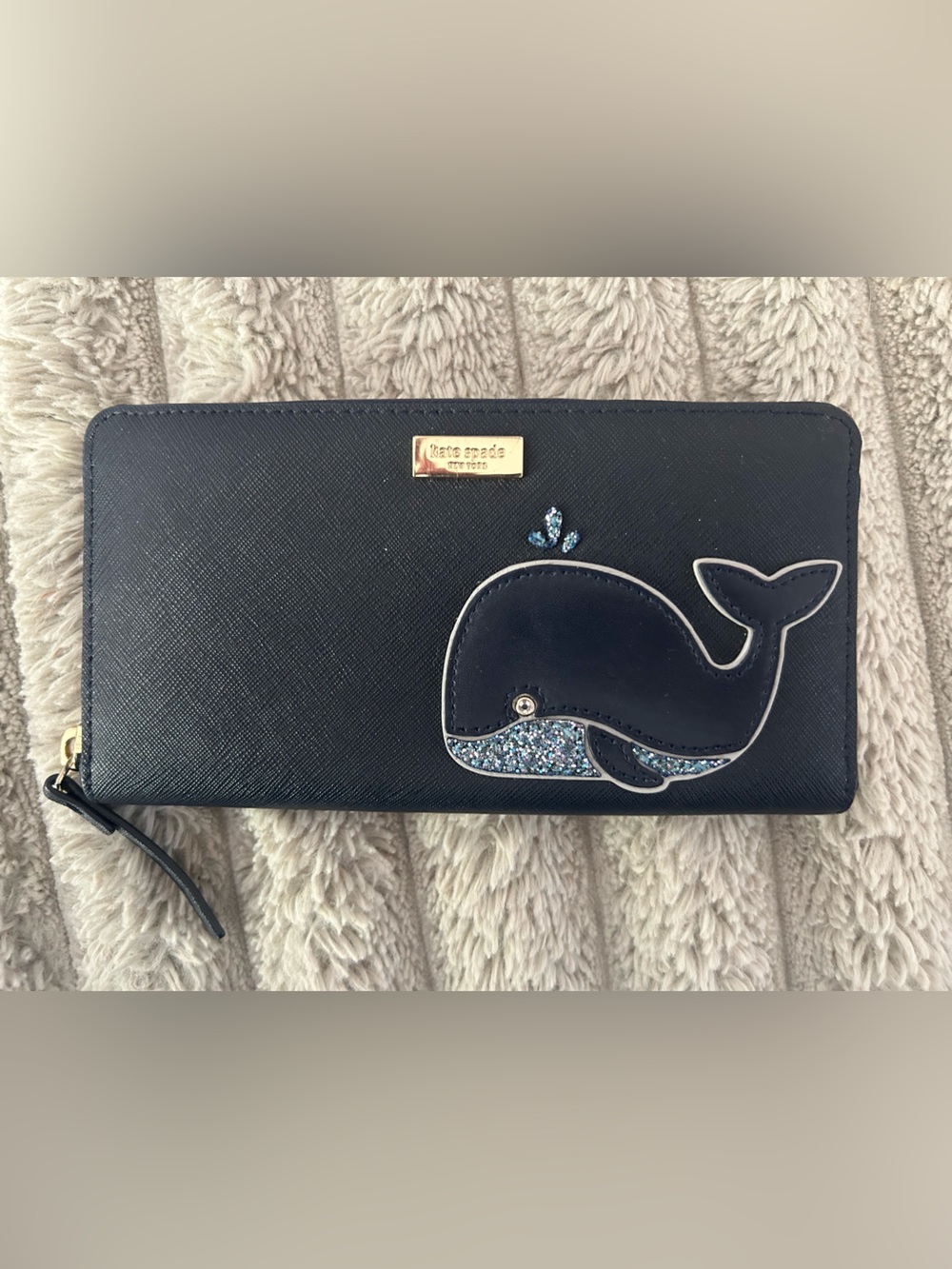 kate spade navy wallet with glitter whale appliqué